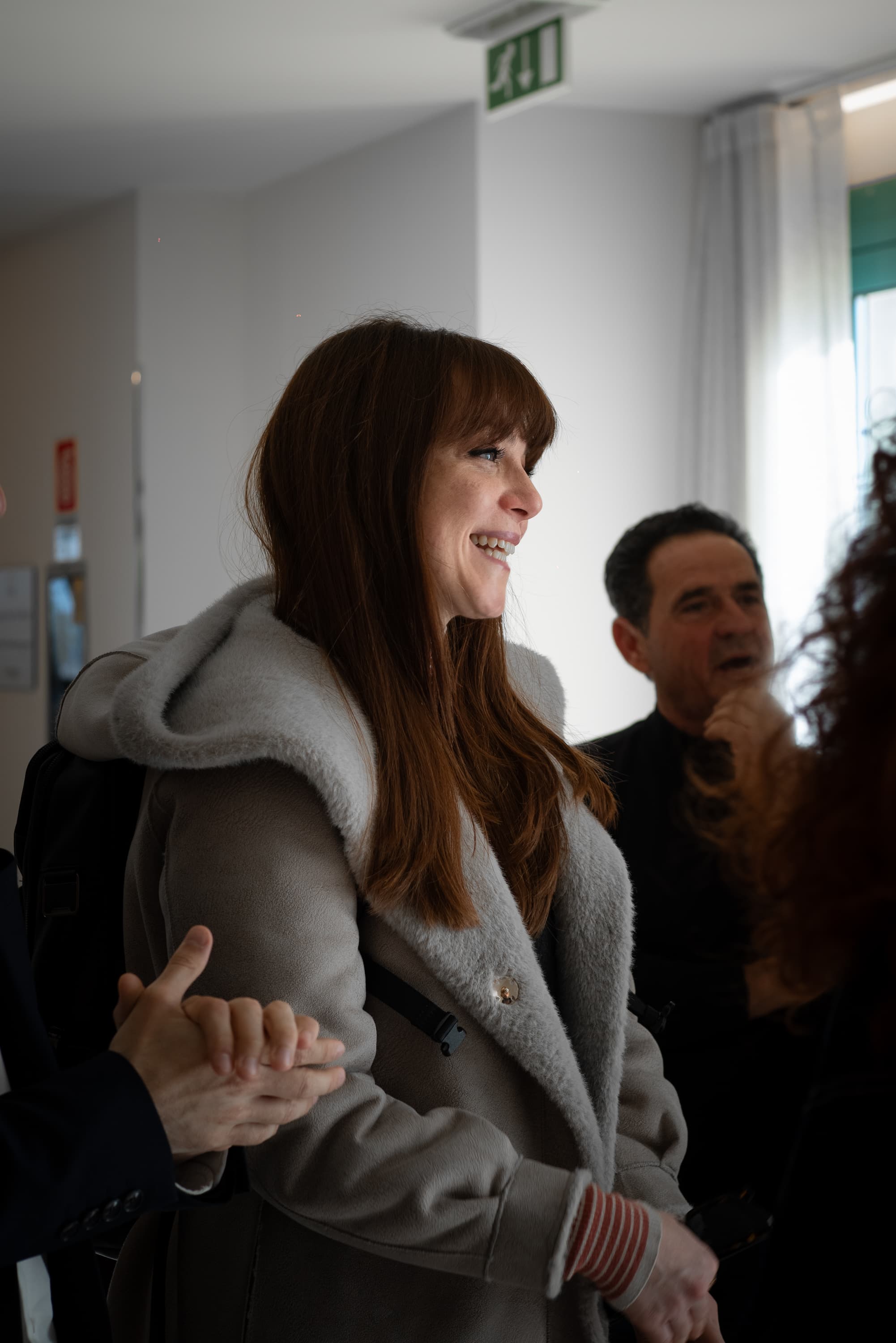 Il gruppo di imprenditori sorride al termine di una giornata in aula